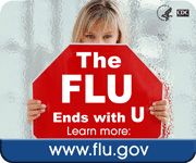 woman holding a sign saying The FLU ends with U, learn more: www.flu.gov