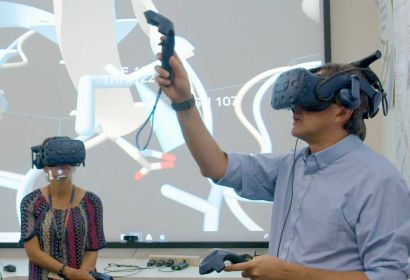Winger and Jacobson wearing VR gear