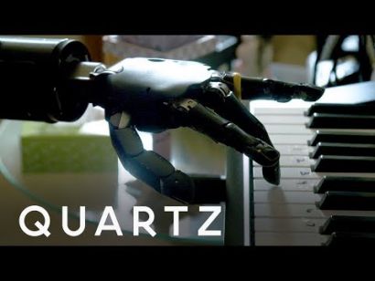 Playing piano with a mind-controlled robotic arm