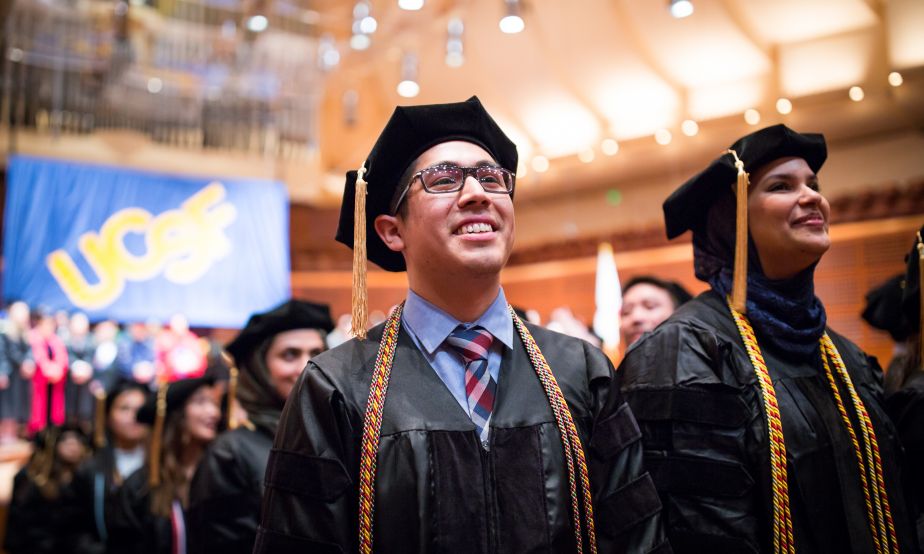 graduates in auditorium