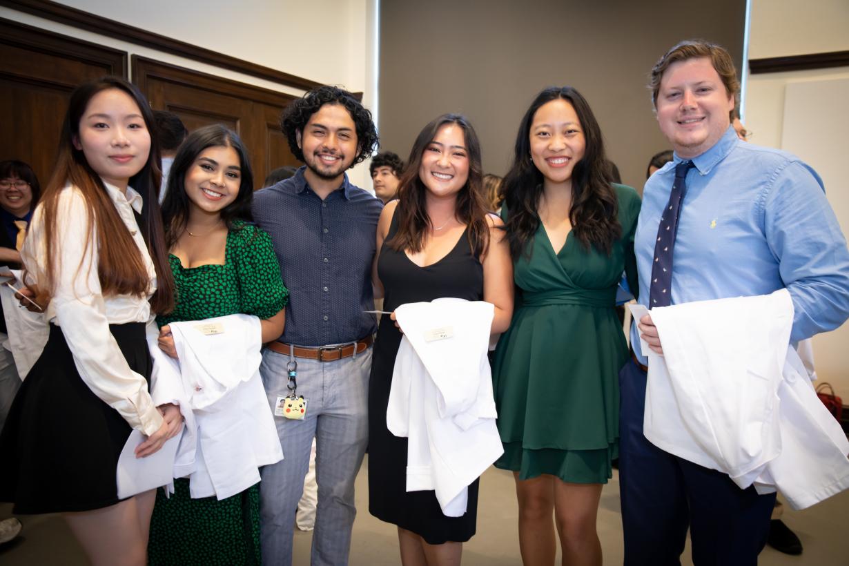 students dressed for the white coat ceremony.