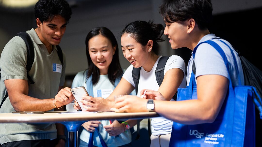 Students Looking at Phone