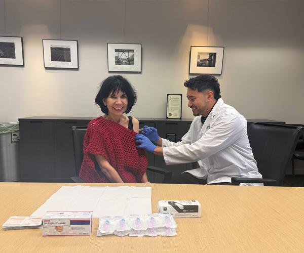 Dean Giacomini gets vaccinated