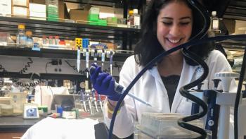 Anasse at lab bench