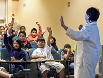 kids raising hands 