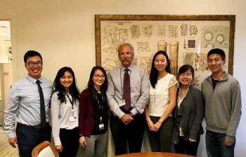 Flu Crew pharmacy students stand with Dean Guglielmo