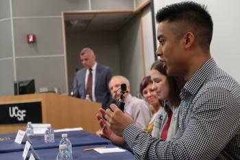 Ta at a discussion on pharmacy