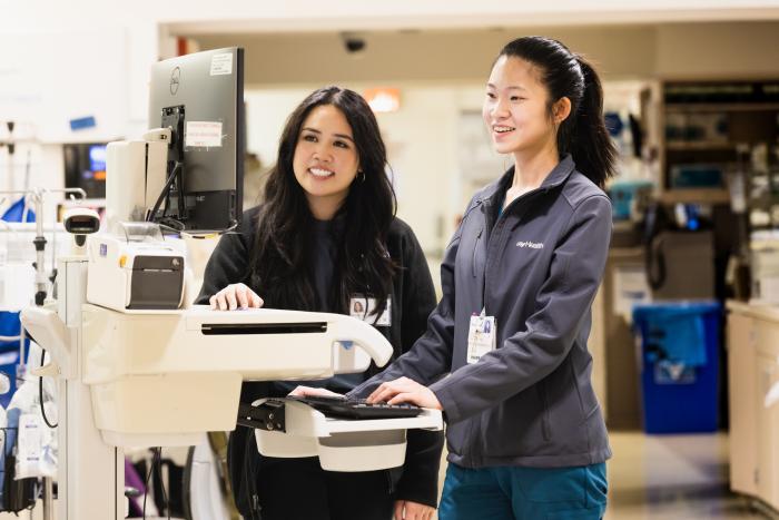 pharmacist with pharmacy student